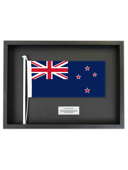 Authentic New Zealand Flag in a Black Oak Frame.