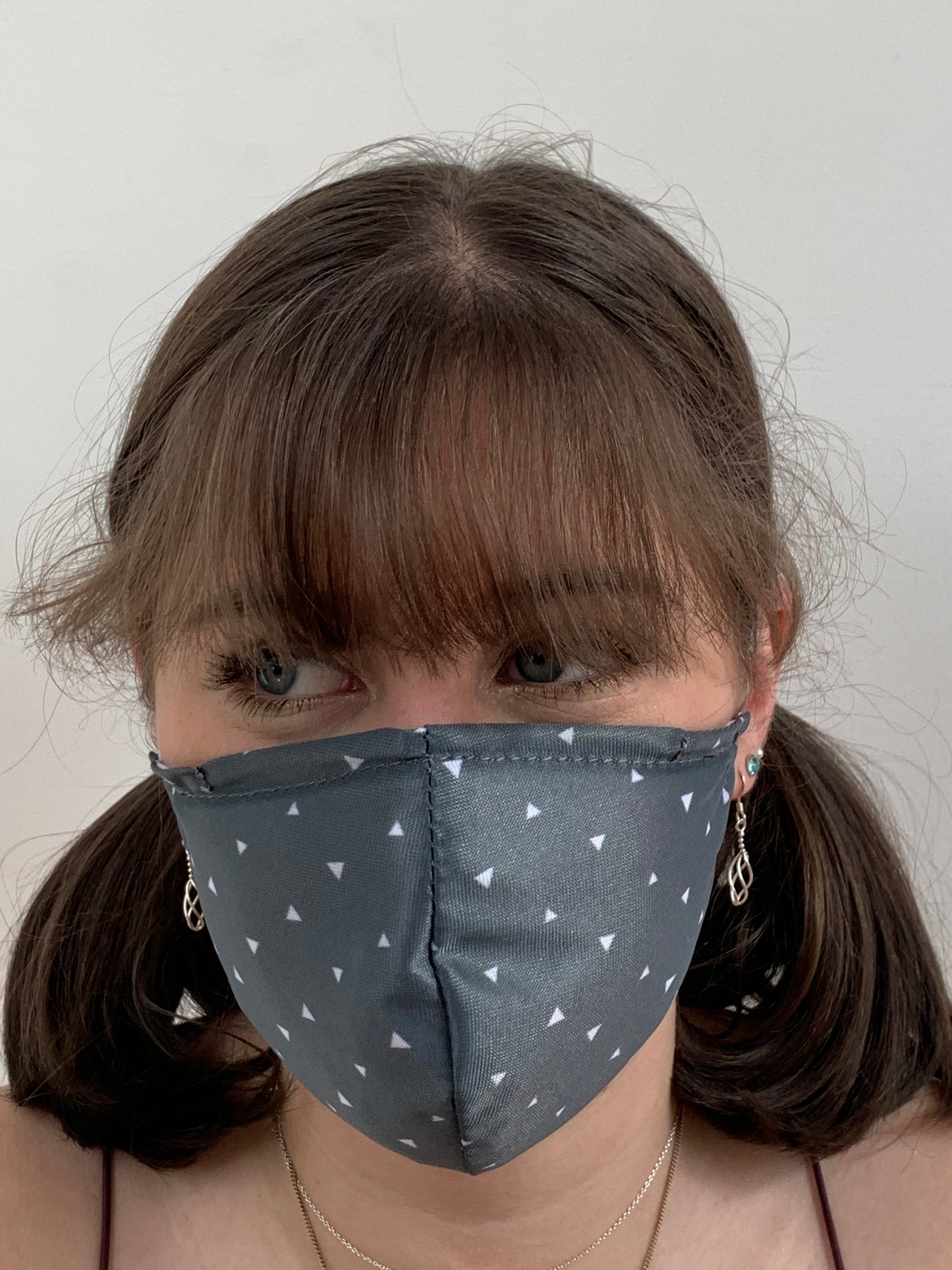 FACE MASKS. GREY TRIANGLE DESIGN ADULT AND CHILD SIZES. PRICED FROM: