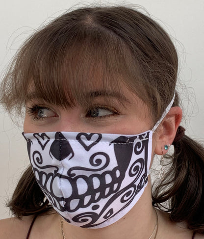 FACE MASKS. DAY OF THE DEAD DESIGN ADULT AND CHILD SIZES. PRICED FROM: