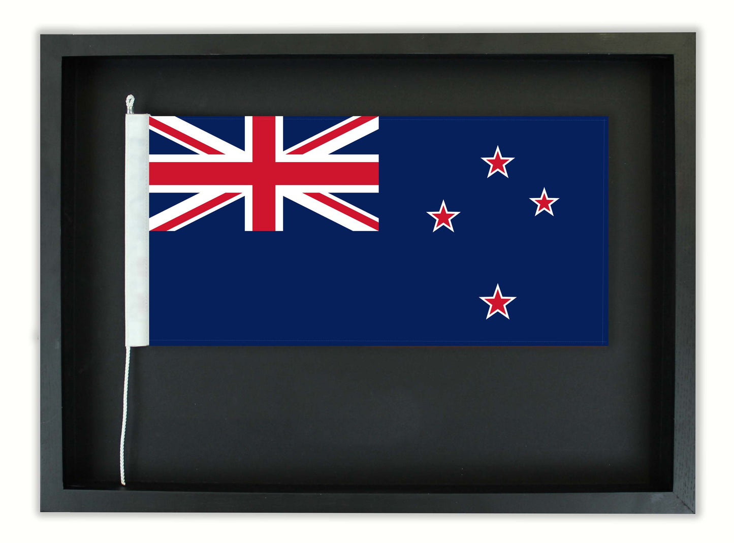 Authentic New Zealand Flag in a Black Oak Frame.